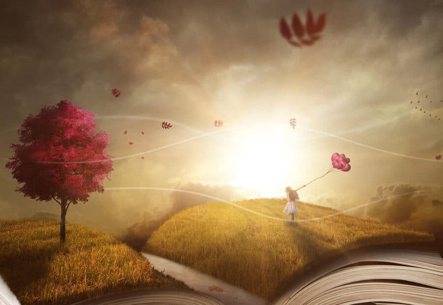 Bambina con palloncini su libro-paesaggio immaginario.